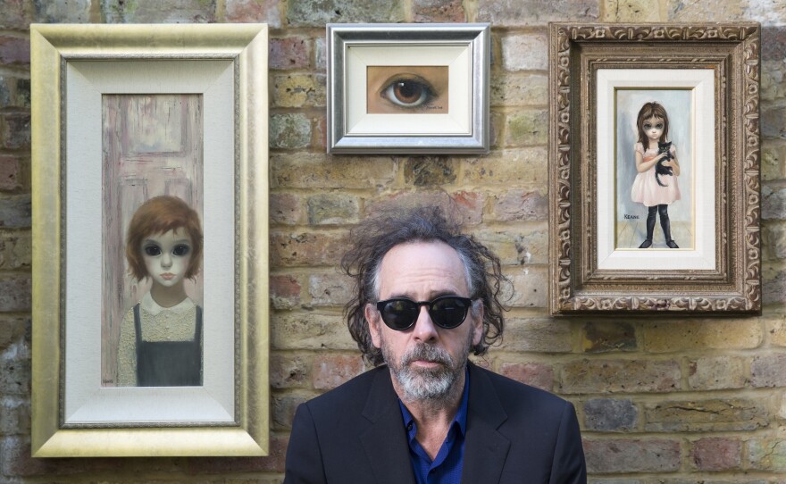 Director Tim Burton with his vintage Margaret Keane paintings.