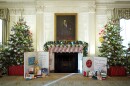 The State Dining Room of the White House is decorated for the holiday season with stockings for family members of President Biden and First Lady Jill Biden.