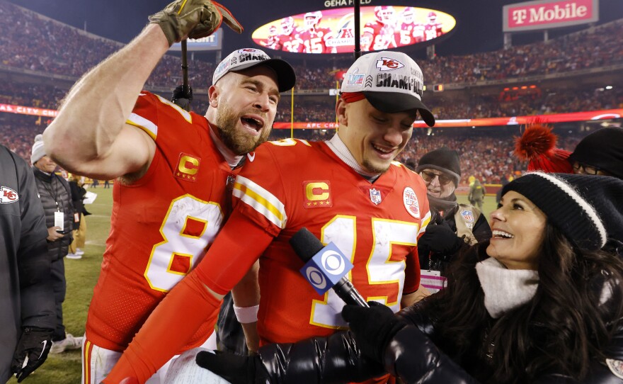 Tight end Travis Kelce, #87, and quarterback Patrick Mahomes, #15, celebrate after their Kansas City Chiefs won the AFC title game.