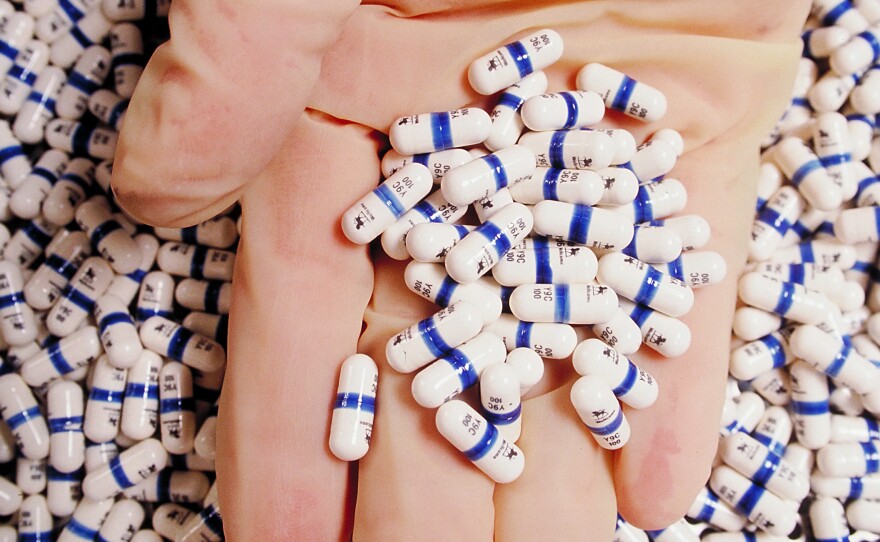 HIV/AIDS drugs like AZT are lifesavers for many people. But insurers' policies on paying for the drugs vary widely.