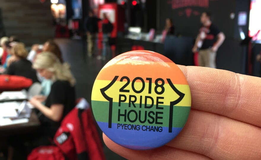 A rainbow button for Pride House Pyeongchang is seen at a display inside Canada House at the Winter Olympics in South Korea.