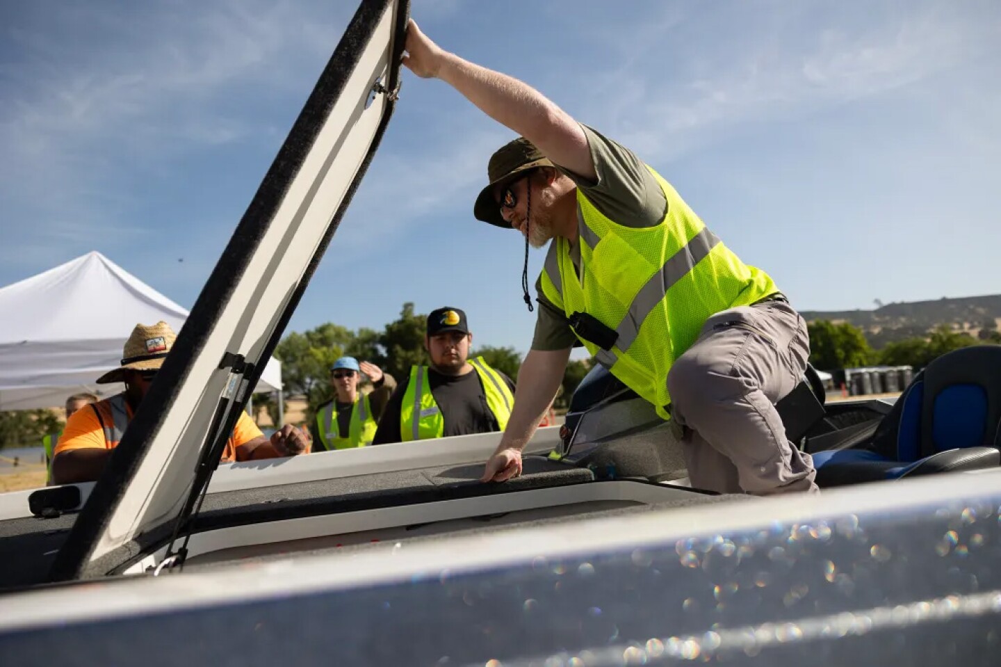 Inspection teams examine boats at the Thermalito Forebay.