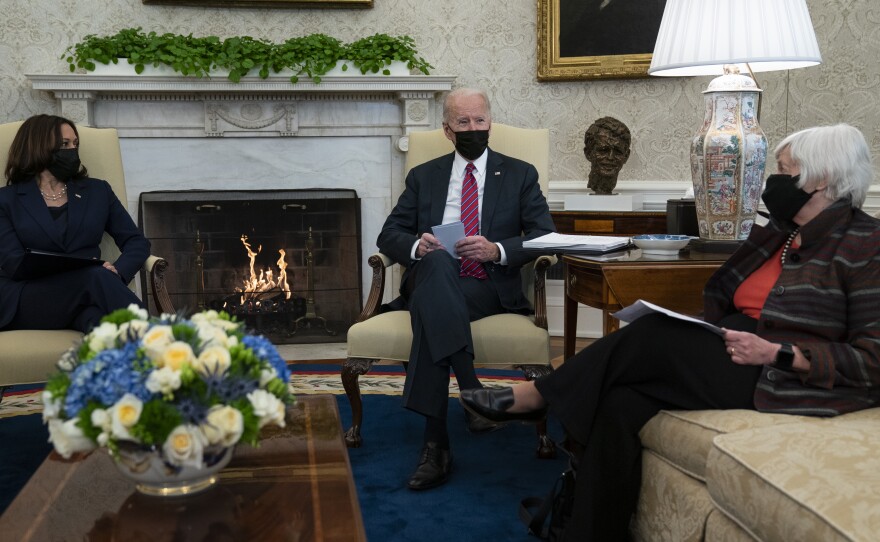 President Biden meets with Treasury Secretary Janet Yellen and Vice President Harris in the Oval Office on Jan. 29.