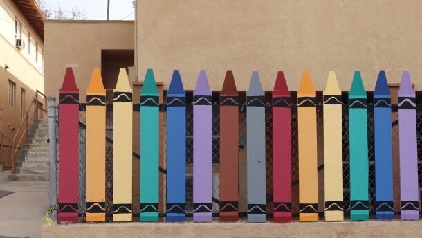A crayon-shaped fence near a school playground at St. Katharine Drexel Academy in El Cerrito is shown on Dec. 31, 2024.