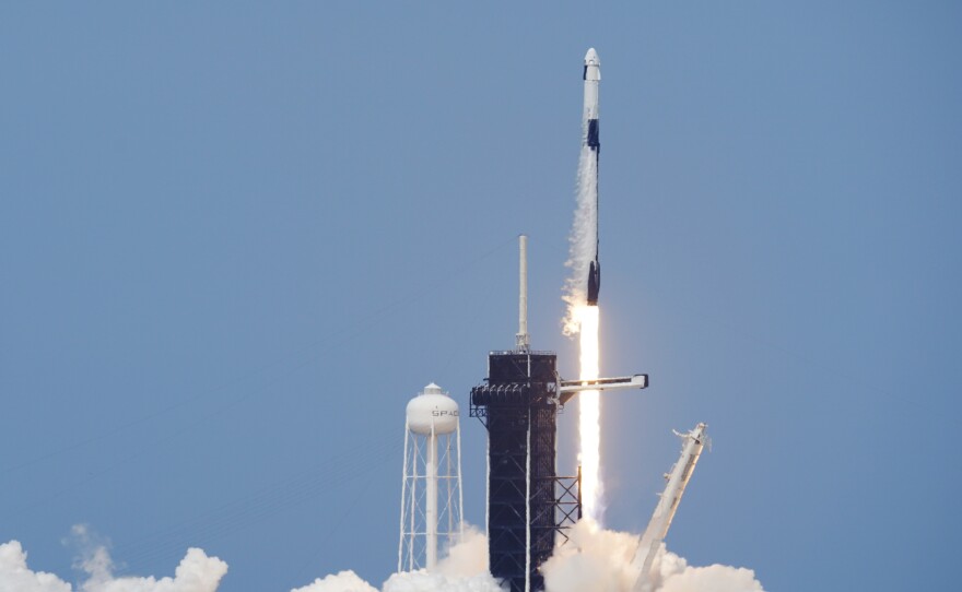 A SpaceX Falcon 9, with NASA astronauts Doug Hurley and Bob Behnken in the Dragon crew capsule, lifts off from Pad 39A at the Kennedy Space Center in Cape Canaveral, Fla., on Saturday.