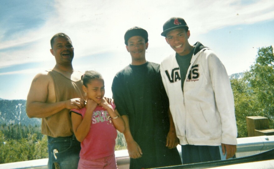 A 2008 family vacation to Big Bear Lake still provides Cheryl Canson some respite, if only in photo form. She carries this picture of her family in happier times between dog-eared pages in her planner. Jafari stands second from the left. Jordan is on the right.