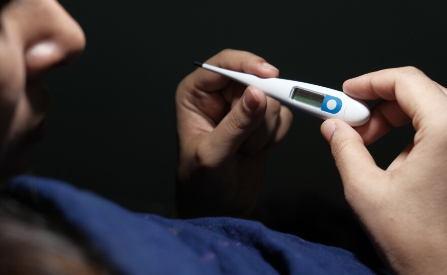 A "mild" breakthrough COVID-19 infection may not feel mild at all.