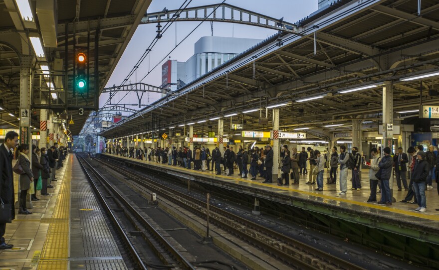 A Japanese train company says it has spoken to a crew that left a station without consulting the time.