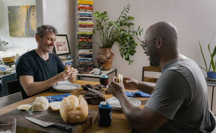 Biologist Shane Campbell-Staton travels the globe to explore how humans have transformed the planet. Seen sharing a meal.