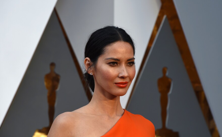 Actress Olivia Munn arrives on the red carpet for the Oscars on Feb. 28. Munn has spoken about being connected to multiple parts of East Asia.