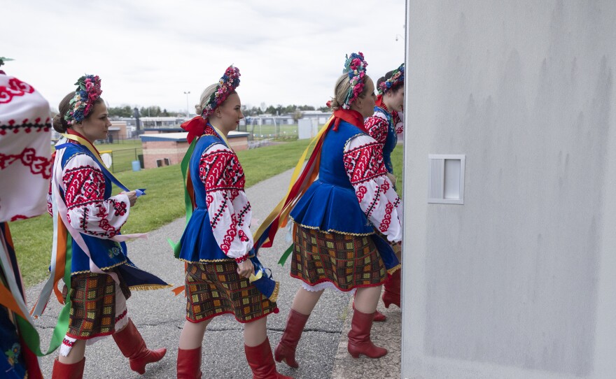 The Voloshky Ukrainian dance ensemble members arrive for their final dance number.