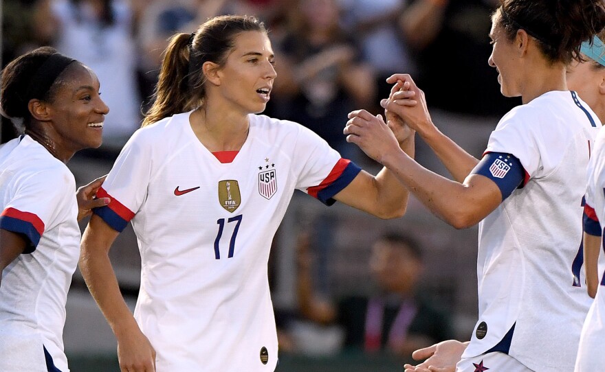 The U.S. women's national team is bringing a veteran roster to the Tokyo Olympics, including Crystal Dunn (left), Tobin Heath and Lloyd.