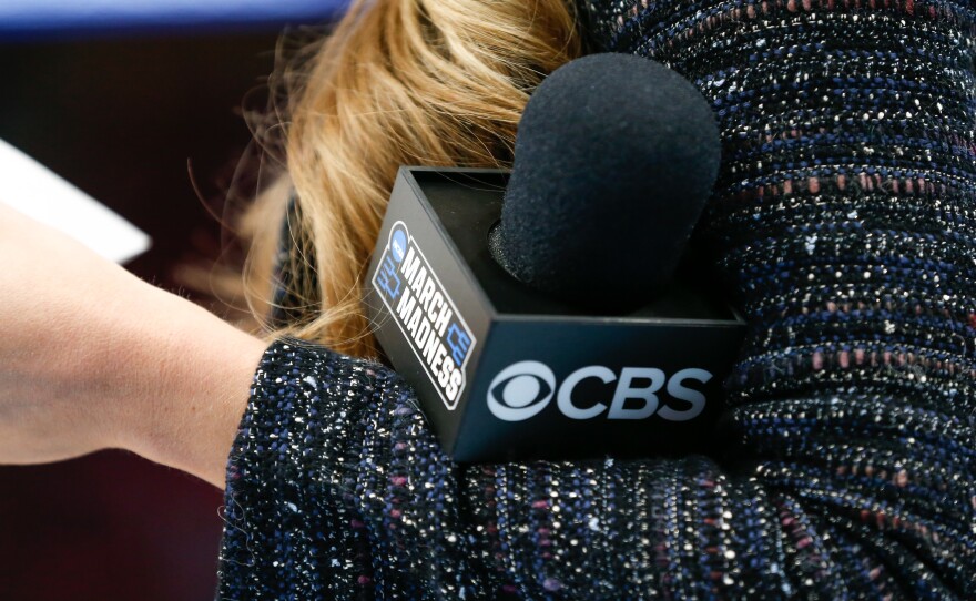 A detail view of the CBS and March Madness logos displayed on a microphone during the NCAA Division I men's championship second round basketball game on March 18, 2018 at Little Caesars Arena in Detroit.