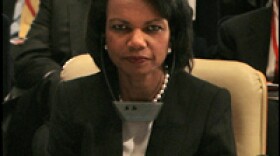 Secretary of State Condoleezza Rice listens to a presentation at an international conference on Iraq.
