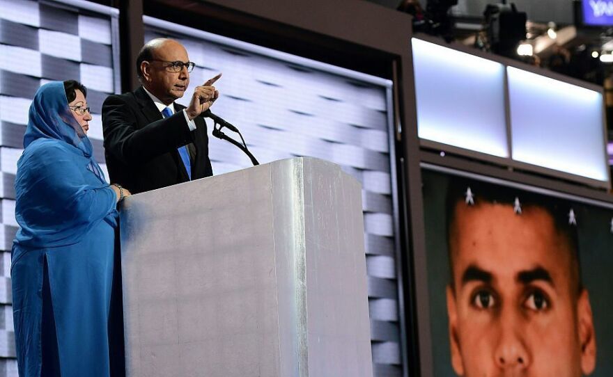 Khizr, whose son was killed in Iraq, speaks directly to Donald Trump at the Democratic National Convention in Philadelphia on July 28. His wife Ghazala Khan stands beside him.