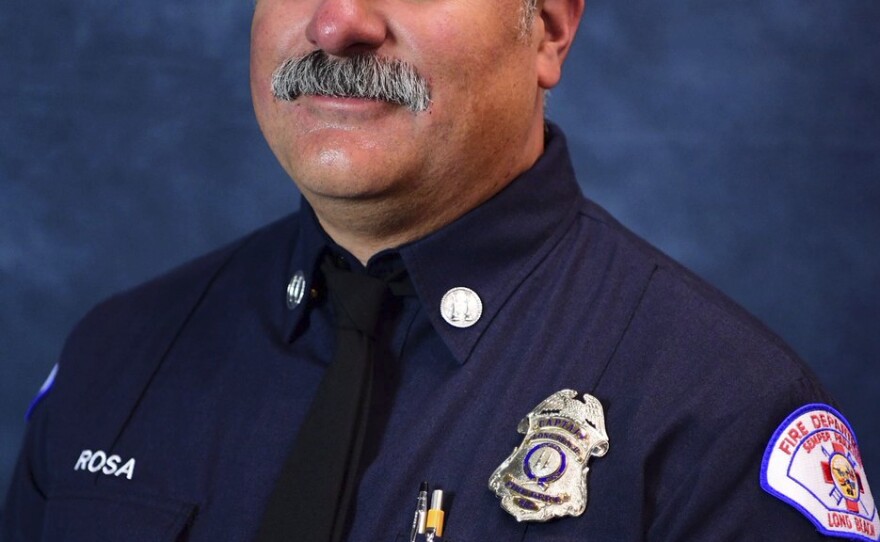 This photo provided by the Long Beach Fire Department shows Captain David Rosa who was fatally shot while responding to an emergency at a senior home on Monday, June 25, 2018 in Long Beach, Calif. Rosa