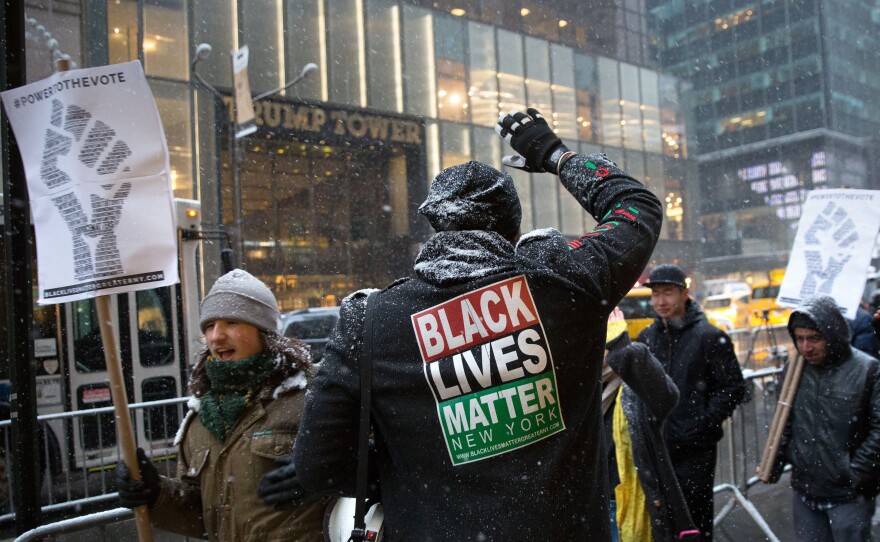 Black Lives Matter activists march in front of Trump Tower on January 14, 2017, in New York City.