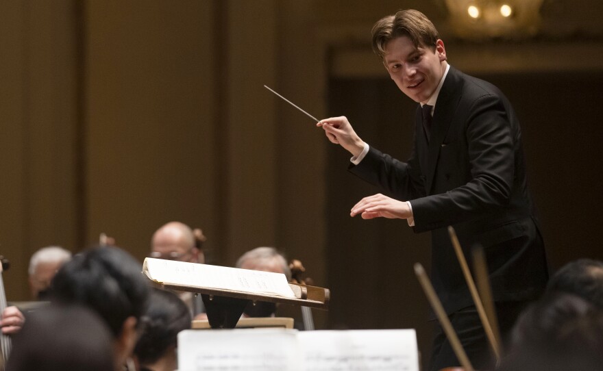 The young Finnish conductor Klaus Mäkelä, leading the Chicago Symphony Orchestra. He is now the ensemble's music director designate.
