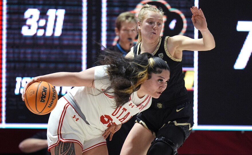 Alissa Pili drives during an NCAA game on Feb. 16.