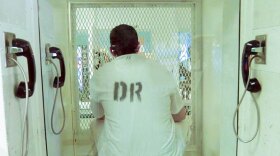 Cameron Todd Willingham — convicted of the Dec. 23, 1991 capital murder of his three children in a fire — waits for guards to take him back to his cell on death row in Livingston, Texas, days before his execution on Feb. 17, 2004.