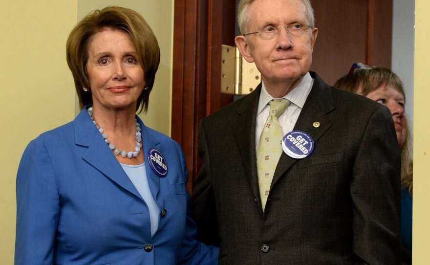 House Minority Leader Nancy Pelosi and Senate Majority Leader Harry Reid celebrate the open enrollment of the Affordable Care Act on Tuesday. During the government shutdown, the Democrats have been more unified than they have been in a long time.