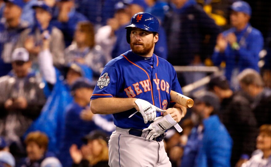 Daniel Murphy of the New York Mets reacts after striking out in the first inning during Game 1 of the World Series at Kauffman Stadium in Kansas City.