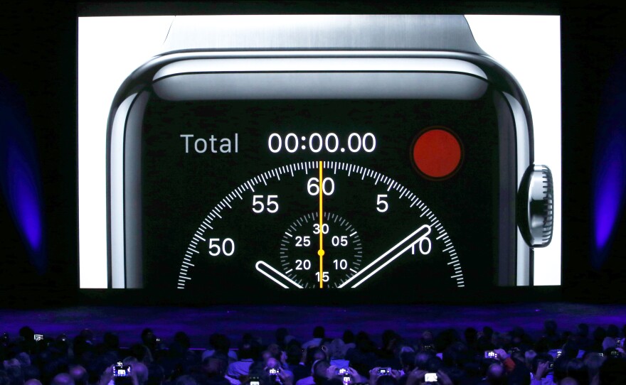 A video about the Apple Watch is shown during an Apple special event in Cupertino, Calif.