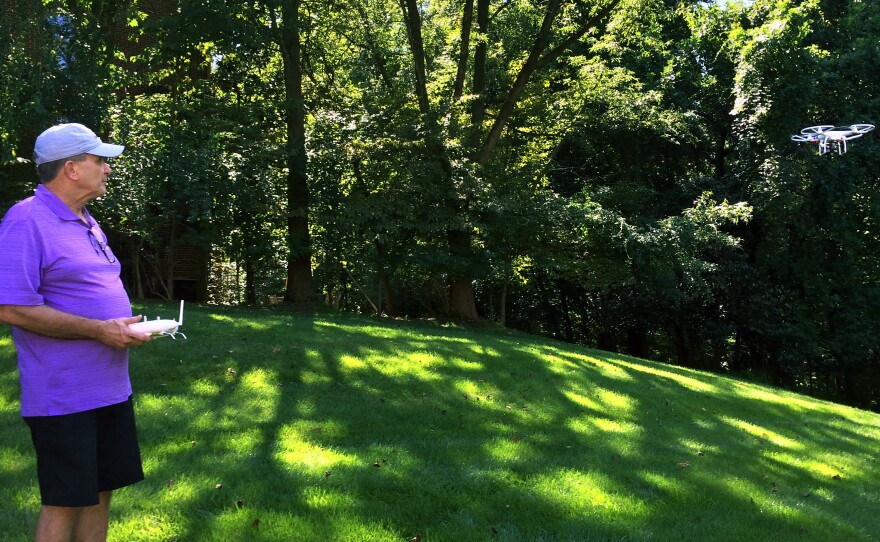 Tom Gorner, founder of Skyscape Services, flies his drone in the backyard of his Virginia home. His company uses the drone to photograph real estate for prospective buyers.