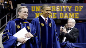 U.S. President Barack Obama and University President Rev. John I. Jenkins (L) walk in for the 164th commencement ceremonies of the University of Notre Dame in the Joyce Center on May 17, 2009 in South Bend, Indiana. 