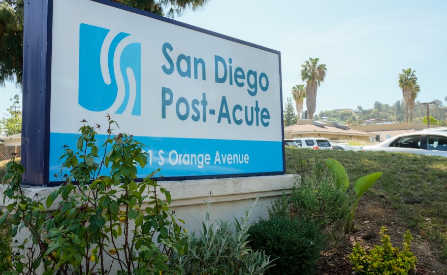 The sign for the San Diego Post-Acute nursing home is pictured in El Cajon, April 13, 2021.