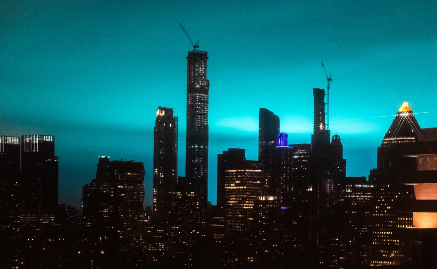 The night sky over New York City turned bright blue Thursday night, the result of a sustained electrical arc flash at an Astoria, Queens, power plant, according to Con Edison.