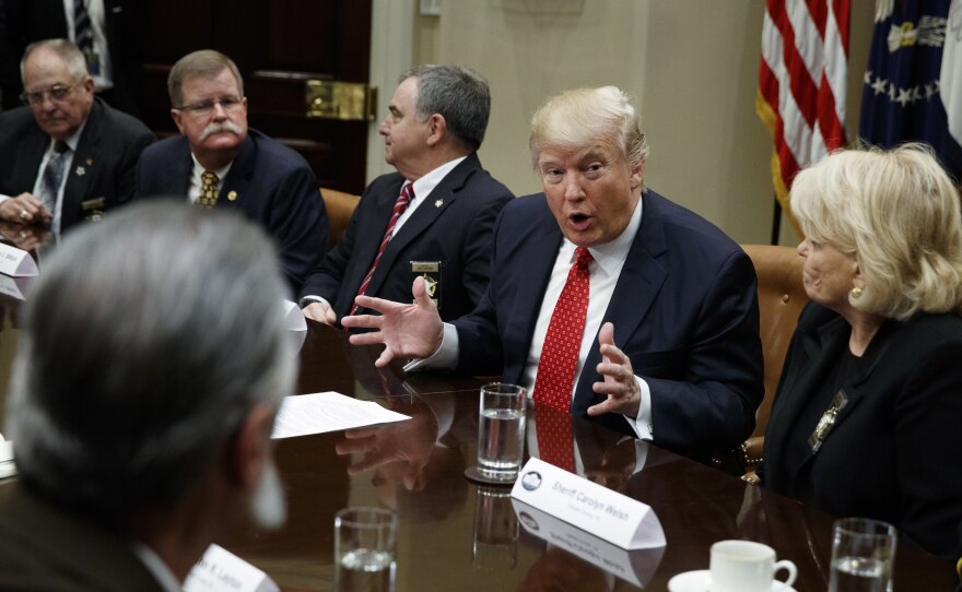 President Trump speaks during a meeting with county sheriffs at the White House on Tuesday.