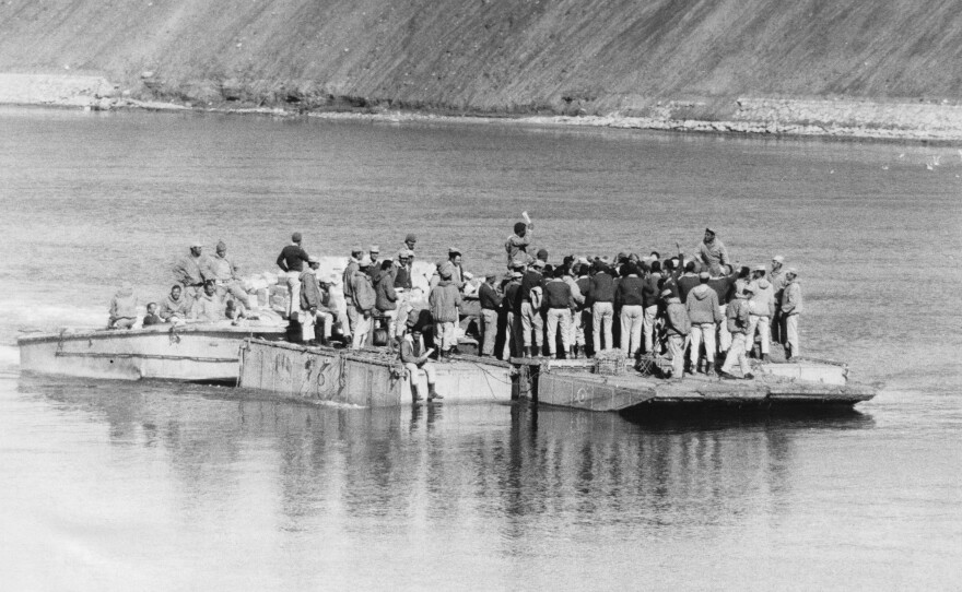 Egyptian soldiers cross to the eastern side of the the Suez Canal during the 1973 war. Egyptian forces initially broke through the Israeli forces on that side of the canal.