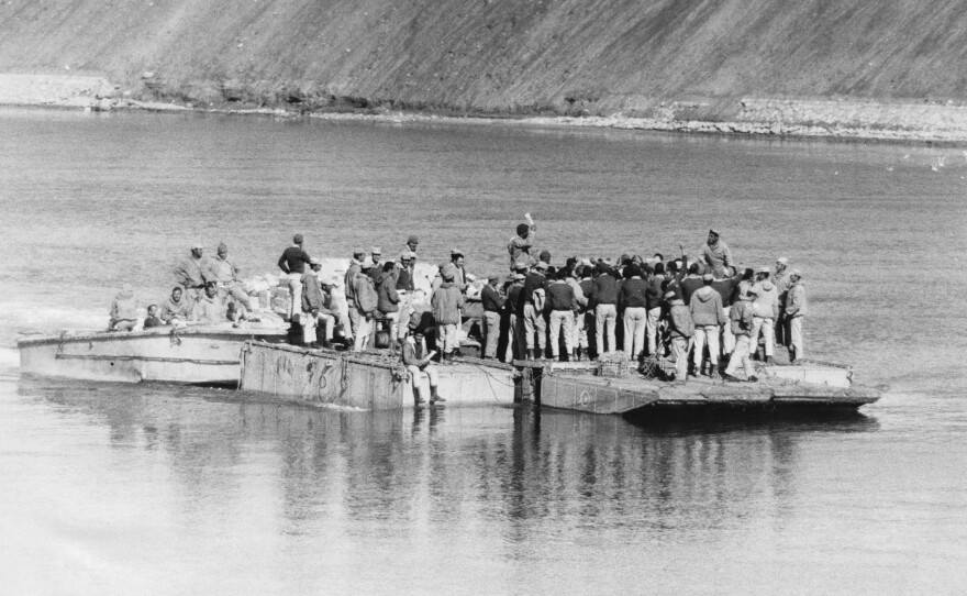 Egyptian soldiers cross to the eastern side of the the Suez Canal during the 1973 war. Egyptian forces initially broke through the Israeli forces on that side of the canal.