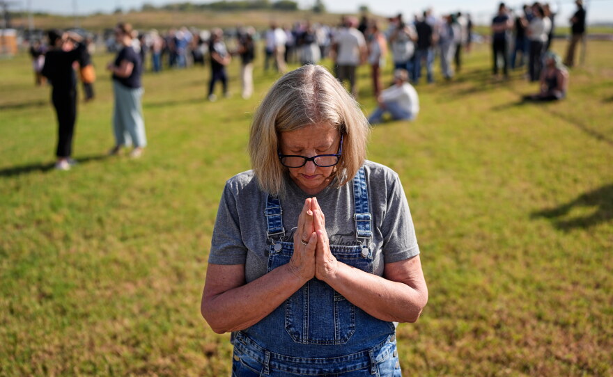 Kathleen Walter prays in the area reserved for people opposed to the death penalty outside Riverbend Maximum Security Institution before the planned execution of Christa Pike, Wednesday, Sept. 30, 2026, in Nashville, Tenn.