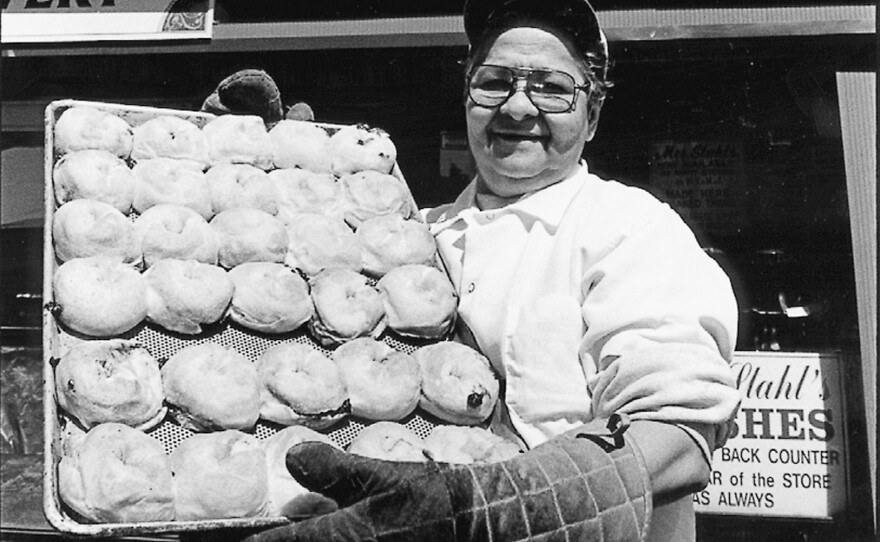 A woman in front of Mrs. Stahl's knish shop in Brooklyn's Brighton Beach neighborhood where author Laura Silver went as a child.