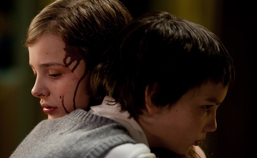 Chloe Grace Moretz and Kodi Smit-McPhee star in "Let Me In."