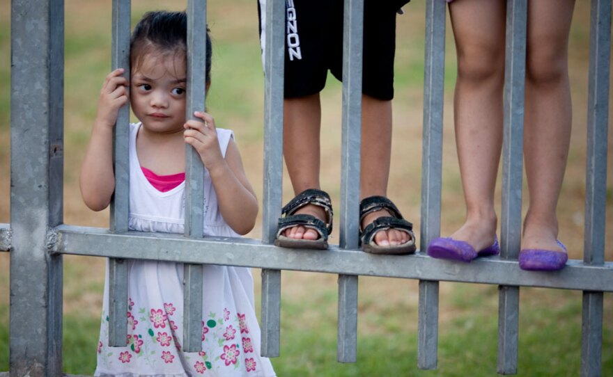 Israel has approved new residency criteria that could result in the deportations of hundreds of children of foreign migrant workers, like those above, shown in Tel Aviv earlier this month. Israelis are divided over whether the children -- many of whom are young, speak Hebrew and were born in Israel -- should be allowed to stay.