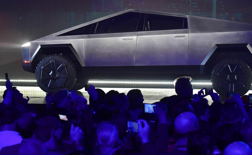 Tesla's Cybertruck, pictured here during its design reveal in Hawthorne, Calif., in 2019, is finally rolling out of factories a full two years after the initial delivery target.