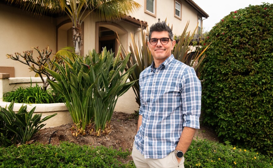 Fran Devlin standing in front of his home in Carlsbad, Calif., March 27, 2025.