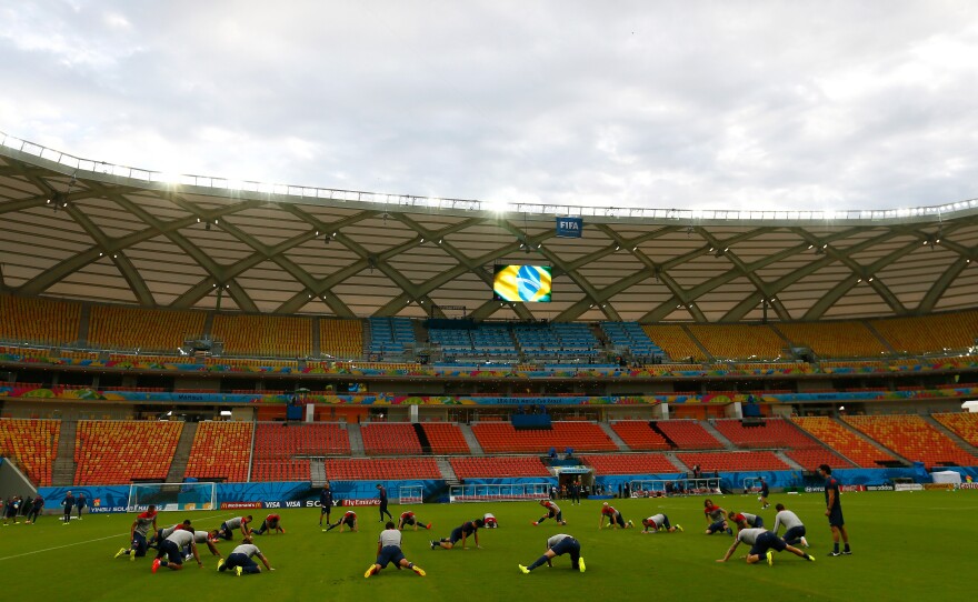 The US Men's National Team stretches prior to training at Arena Amazonia on Sunday in Manaus, Brazil.