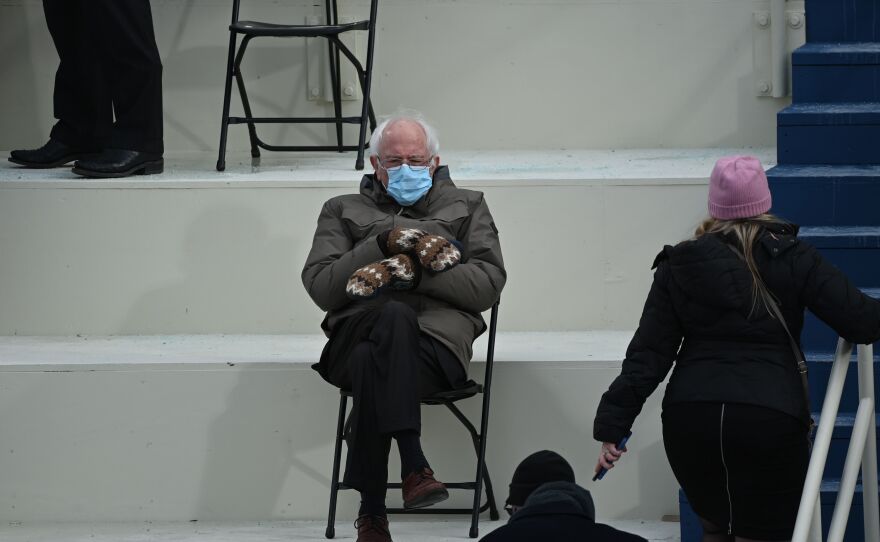 Sen. Bernie Sanders (I-Vt.), a former presidential candidate, looks toasty in the bleachers before Joe Biden is sworn in.