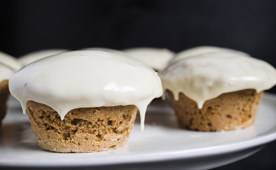 Glazed Maple-Whole Wheat Muffins, a morning treat with nuttiness from the flour and acidity from the maple-lemon glaze.