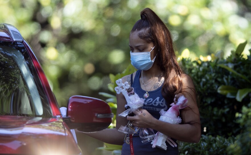 Charmaine Turner prepares to enter a viewing her for 8-year-old daughter Secoriea Turner, who was fatally shot in Atlanta on July 4 in 2020.