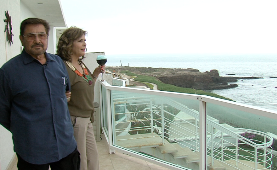 Sylvia Villavicencio and Mike Rodriguez enjoy the view of the ocean from their Tijuana condominium, April 8, 2016. 