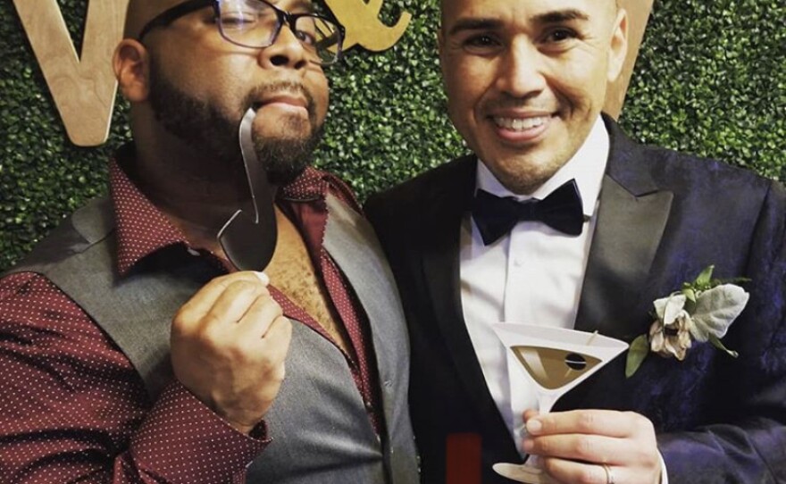 Scott Blanks, left, with his friend Vincent Estrada at Estrada's wedding in December.