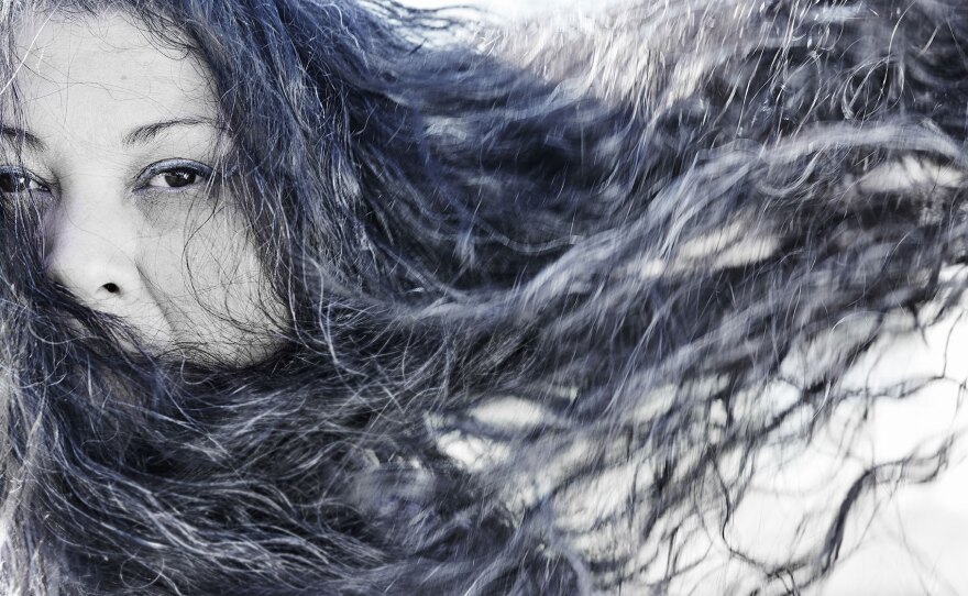 A photograph of Theresa is part of "Voices on the Inside," on view at San Diego Central Library's Popular Library Fairway through July 31, 2024.