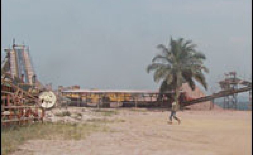 The heat is sweltering and the landscape is bleak at the site of the Brazzaville quarry.