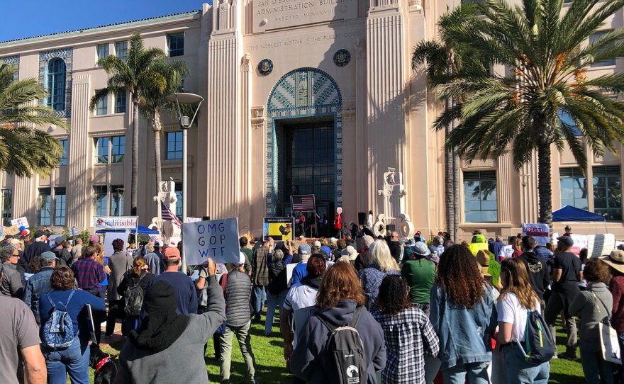 Demonstrators attend a pro-impeachment rally at the San Diego County Administration building, Dec. 15, 2019.
