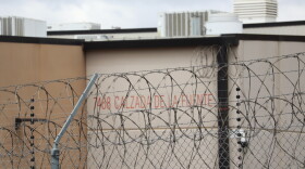 Barbed wire lines the fence of the Otay Mesa Detention Center on Thursday, April 2, 2026.